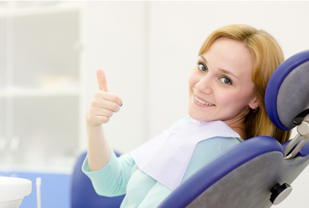 Woman enjoying stress free Dental visit.